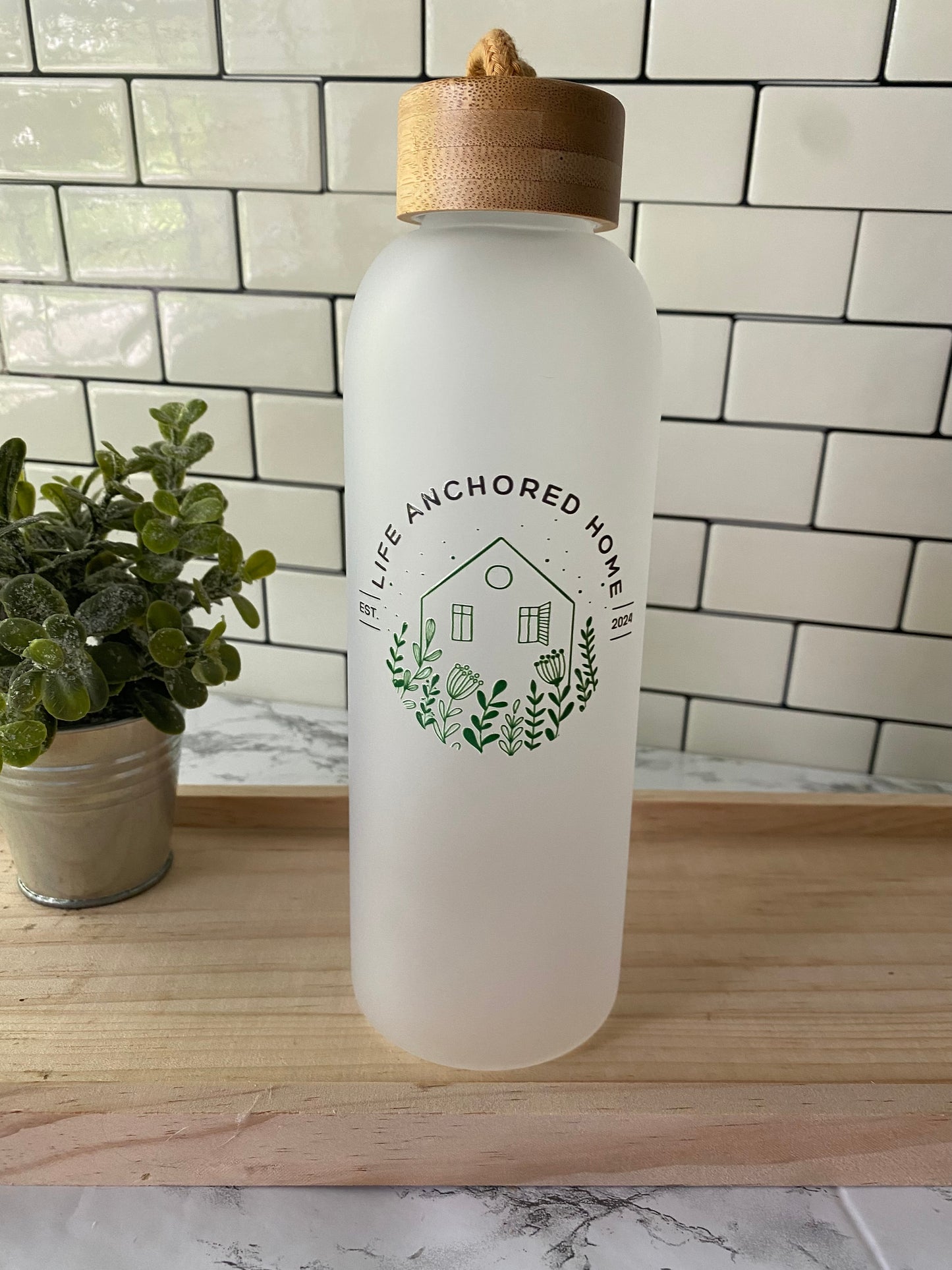 Life Anchored Home glass water bottle